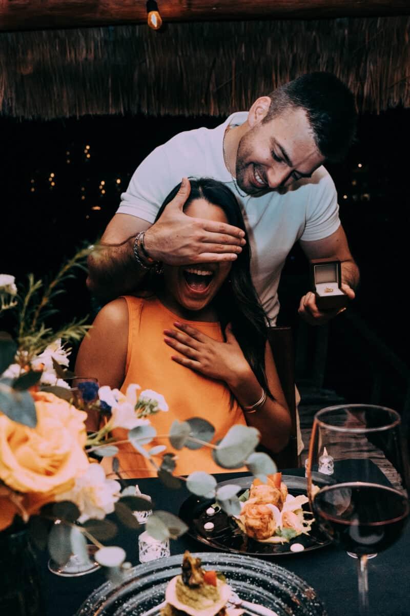 Surprise proposal with eyes covered – playful engagement moment